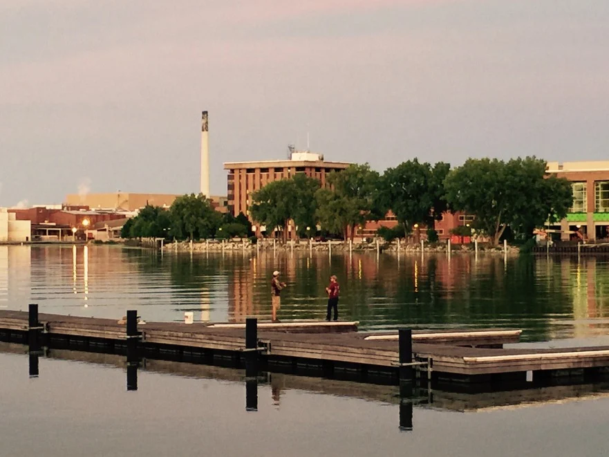 City Fishing On The Fox River At Dusk In Green Bay