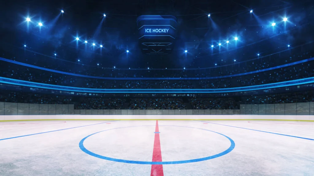 Computer gegenereerd beeld van een ijshockeybaan in een groot stadion met felle spotlights en een menigte op de tribune