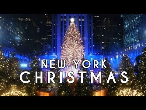 Videominiatuur met de verlichte kerstboom bij Rockefeller Center in de sneeuw en de tekst New York Christmas