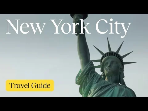 Videothumbnail met een close-up van het hoofd en de opgeheven fakkel van het Vrijheidsbeeld en de tekst New York City