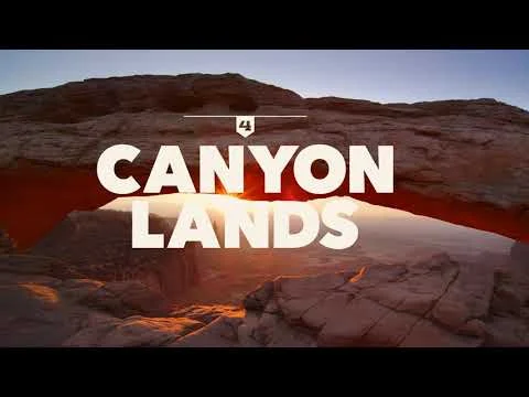 Videothumbnail met een zandstenen rotsboog die oplicht in de zonsopkomst en de tekst Canyonlands, met rotsformaties op de achtergrond