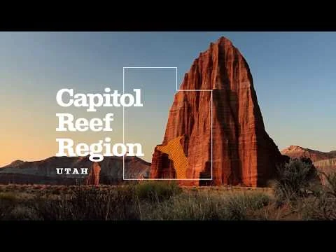 Videothumbnail met een hoge rode rotstoren bij zonsondergang en de tekst Capitol Reef Region Utah